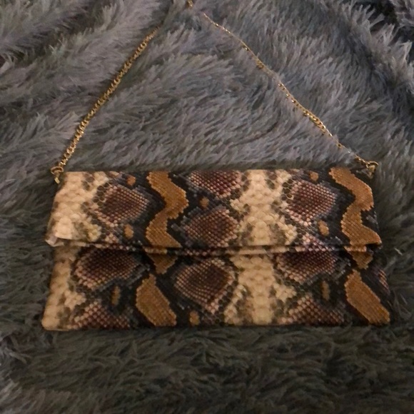 Express Handbags - Express faux snake skin clutch. #nwot
